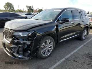 2023 Cadillac XT6 FWD Premium Luxury with VIN 1GYKPCRS5PZ200527, listed as a Copart auction lot 82838044 with 45,015 mi miles and Salvage Title. Bid and sale history available at carsss.com. Image 1.