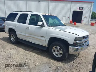 2003 Chevrolet Tahoe LS z VIN 1GNEC13Z33J114576, wystawiony jako IAAI lot #42342687 z przebiegiem 318 291 mil mil oraz . Historia ofert i sprzedaży dostępna na DreamBid. Obrazek 1.