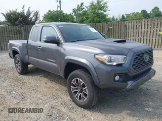 2020 Toyota Tacoma SR with VIN 3TYSZ5AN0LT001063, listed as a IAAI auction lot 42501914 with 34,114 mi miles and . Bid and sale history available at DreamBid. Image 1.