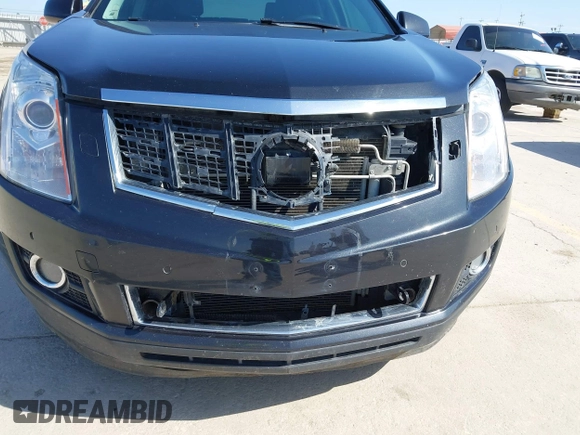 2013 Cadillac SRX Performance Collection with VIN 3GYFNHE35DS548632, listed as a IAAI auction lot 41990670 with 98,659 mi miles. Bid and sale history available at carsss.com. Image 6.