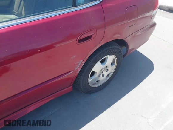 2001 Honda Accord EX with VIN 1HGCG16571A036914, listed as a IAAI auction lot 42670933 with 129,234 mi miles and . Bid and sale history available at DreamBid. Image 12.