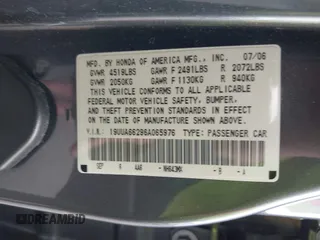 2006 Acura TL with VIN 19UUA66296A065976, listed as a IAAI auction lot 42122394 with 136,214 mi miles. Bid and sale history available at carsss.com. Image 9.