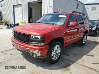 2001 Chevrolet Tahoe LT with VIN 1GNEC13T11R144184, listed as a Copart auction lot 57570885 with Not provided miles and Salvage title. Bid and sale history available at DreamBid. Image 1.