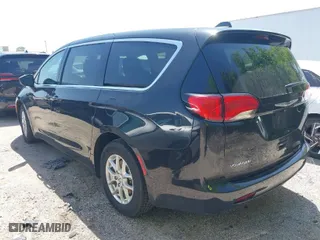 2023 Chrysler Voyager LX with VIN 2C4RC1CG1PR597348, listed as a IAAI auction lot 42013850 with 61,844 mi miles. Bid and sale history available at carsss.com. Image 3.