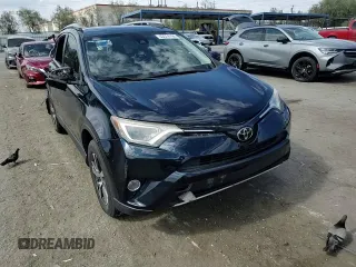 2018 Toyota RAV4 XLE with VIN JTMWFREV7JD130465, listed as a Copart auction lot 63314795 with 97,334 mi miles and Salvage title. Bid and sale history available at DreamBid. Image 14.