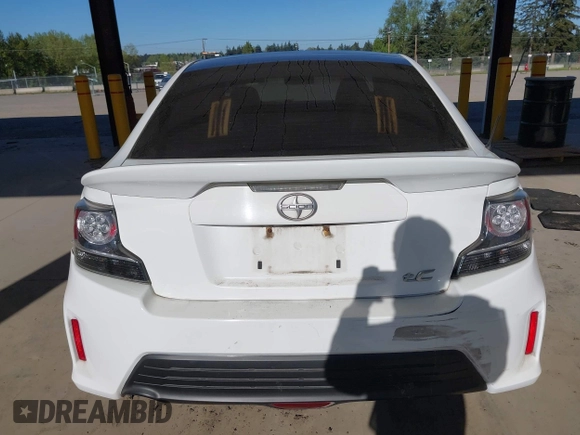 2014 Scion tC with VIN JTKJF5C7XE3073478, listed as a IAAI auction lot 42058385 with 151,491 mi miles. Bid and sale history available at carsss.com. Image 17.