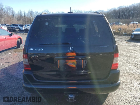 2001 Mercedes-Benz M 320/430/500 with VIN 4JGAB72EX1A277472, listed as a Copart auction lot 86857214 with Not provided miles and Salvage title. Bid and sale history available at DreamBid. Image 6.