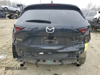 2020 Mazda CX-5 Touring with VIN JM3KFACM1L0767976, listed as a Copart auction lot 46299715 with 148,137 mi miles and Salvage Title. Bid and sale history available at carsss.com. Image 6.