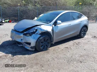 2024 Tesla Model Y Long Range with VIN 7SAYGDEE2RA311261, listed as a IAAI auction lot 41534010 with Not Provided miles and . Bid and sale history available at DreamBid. Image 20.