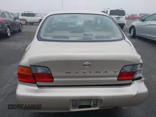 1995 Nissan Maxima GLE z VIN JN1CA21DXST075946, wystawiony jako IAAI lot #41669451 z przebiegiem 154 423 mil mil oraz . Historia ofert i sprzedaży dostępna na DreamBid. Obrazek 16.