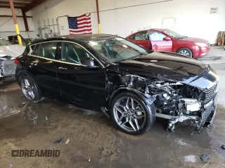 2018 Infiniti QX30 Premium with VIN SJKCH5CP8JA041948, listed as a Copart auction lot 53582513 with 56,915 mi miles and Salvage title. Bid and sale history available at DreamBid. Image 4.