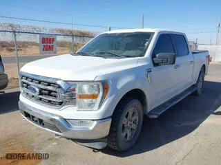 2021 Ford F-150 XL with VIN 1FTFW1E86MFC72651, listed as a IAAI auction lot 41840341 with 100,645 mi miles. Bid and sale history available at carsss.com. Image 2.