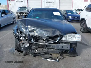 2001 Acura RL w/Navigation System z VIN JH4KA966X1C001287, wystawiony jako IAAI lot #41494316 z przebiegiem 205 724 mil mil oraz . Historia ofert i sprzedaży dostępna na DreamBid. Obrazek 12.