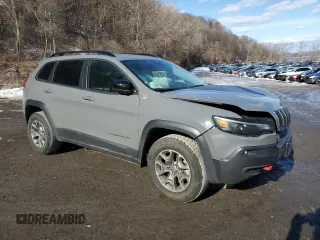 2022 Jeep Cherokee Trailhawk with VIN 1C4PJMBX4ND518870, listed as a Copart auction lot 44784025 with 17,701 mi miles and Salvage Title. Bid and sale history available at carsss.com. Image 4.