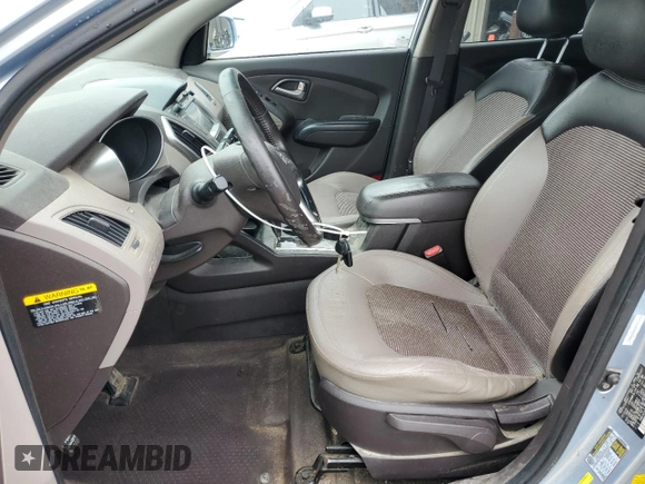 2011 Hyundai Tucson Limited with VIN KM8JUCAC8BU196358, listed as a Copart auction lot 51111975 with 200,439 mi miles and Salvage Title. Bid and sale history available at DreamBid. Image 7.