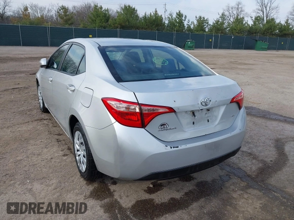2019 Toyota Corolla L with VIN 5YFBURHE2KP934042, listed as a IAAI auction lot 41963491 with 87,299 mi miles. Bid and sale history available at carsss.com. Image 3.