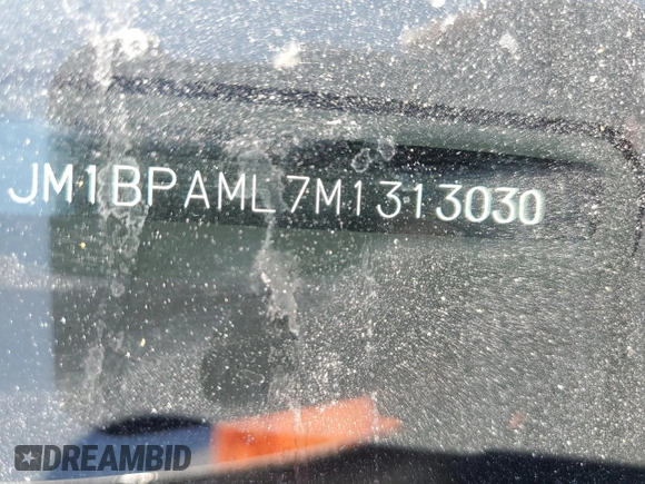 2021 Mazda 3 Premium with VIN JM1BPAML7M1313030, listed as a Copart auction lot 57112895 with 38,251 mi miles and Salvage Title. Bid and sale history available at DreamBid. Image 12.