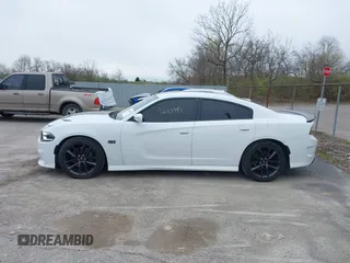2019 Dodge Charger Scat Pack with VIN 2C3CDXGJXKH635612, listed as a IAAI auction lot 42010995 with 34,860 mi miles and . Bid and sale history available at DreamBid. Image 14.