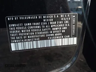 2014 Volkswagen Jetta Sedan SE w/Connectivity with VIN 3VWD07AJ8EM427848, listed as a IAAI auction lot 40988647 with 134,773 mi miles. Bid and sale history available at carsss.com. Image 9.