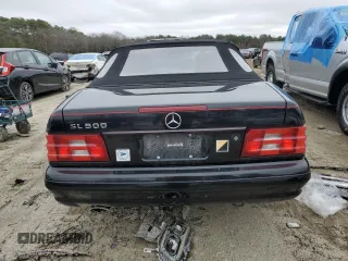 1999 Mercedes-Benz SL-Class with VIN WDBFA68F0XF184008, listed as a Copart auction lot 84998014 with 74,809 mi miles and Salvage Title. Bid and sale history available at carsss.com. Image 6.