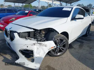 2021 BMW 2 Series 228i with VIN WBA53AK09M7H30650, listed as a IAAI auction lot 42043390 with 89,611 mi miles and . Bid and sale history available at DreamBid. Image 18.