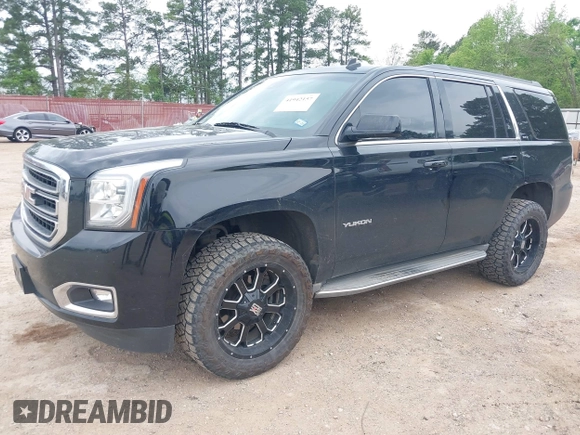 2015 GMC Yukon SLT with VIN 1GKS1BKC5FR274408, listed as a IAAI auction lot 41942157 with 165,978 mi miles. Bid and sale history available at carsss.com. Image 17.