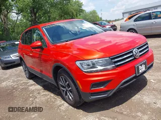 2019 Volkswagen Tiguan SE with VIN 3VV2B7AX8KM165738, listed as a IAAI auction lot 42390543 with 58,105 mi miles and . Bid and sale history available at DreamBid. Image 1.