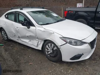 2014 Mazda Mazda3 i Sport with VIN JM1BM1U75E1130979, listed as a IAAI auction lot 41094791 with 100,518 mi miles. Bid and sale history available at carsss.com. Image 1.