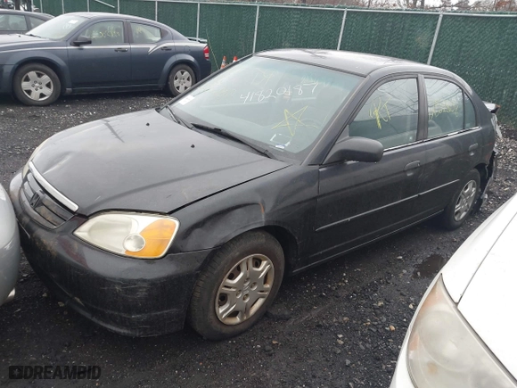 2001 Honda Civic LX with VIN 2HGES16511H554283, listed as a IAAI auction lot 41820187 with 999,999 mi miles. Bid and sale history available at carsss.com. Image 2.