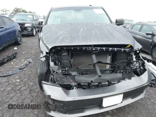 2021 Ram 1500 Tradesman z VIN 3C6RR6KT2MG704541, wystawiony jako IAAI lot #42234019 z przebiegiem 19 227 mil mil oraz . Historia ofert i sprzedaży dostępna na DreamBid. Obrazek 6.