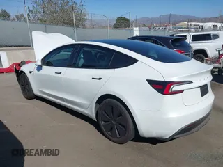 2024 Tesla Model 3 with VIN 5YJ3E1EA7RF812528, listed as a IAAI auction lot 40648421 with 3,231 mi miles. Bid and sale history available at carsss.com. Image 3.
