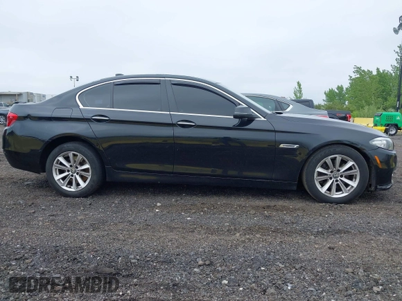 2014 BMW 5 Series 528i xDrive with VIN WBA5A7C54ED613352, listed as a IAAI auction lot 42197717 with 205,889 mi miles and . Bid and sale history available at DreamBid. Image 13.
