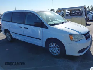 2014 Ram Cargo Van Tradesman with VIN 2C4JRGAG7ER182016, listed as a IAAI auction lot 40917239 with 183,562 mi miles. Bid and sale history available at carsss.com. Image 1.