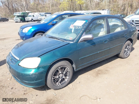 2002 Honda Civic LX with VIN 1HGES16552L011961, listed as a IAAI auction lot 42107230 with 172,787 mi miles. Bid and sale history available at carsss.com. Image 6.