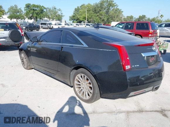 2012 Cadillac CTS Premium z VIN 1G6DP1E3XC0116593, wystawiony jako IAAI lot #42138575 z przebiegiem 198 884 mil mil oraz . Historia ofert i sprzedaży dostępna na DreamBid. Obrazek 3.