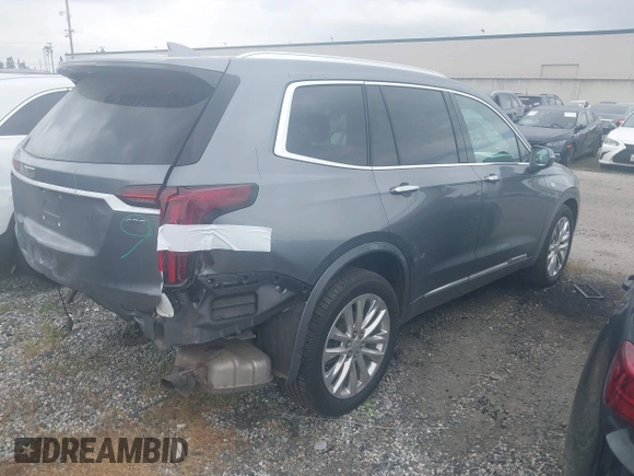 2020 Cadillac XT6 FWD Premium Luxury with VIN 1GYKPCRSXLZ105231, listed as a IAAI auction lot 42115169 with 70,319 mi miles. Bid and sale history available at carsss.com. Image 4.