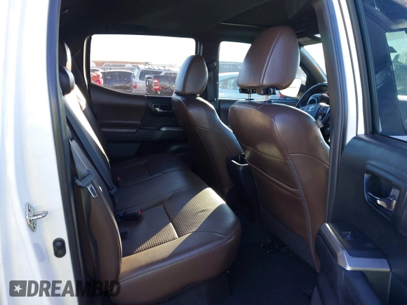 2016 Toyota Tacoma Limited with VIN 5TFEZ5CN4GX009513, listed as a IAAI auction lot 41363058 with 108,382 mi miles and . Bid and sale history available at DreamBid. Image 8.