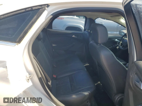 2016 Ford Focus Titanium z VIN 1FADP3J25GL201003, wystawiony jako Copart lot #53799745 z przebiegiem 194 055 mil mil oraz Szkoda całkowita • Salvage title. Historia ofert i sprzedaży dostępna na DreamBid. Obrazek 10.