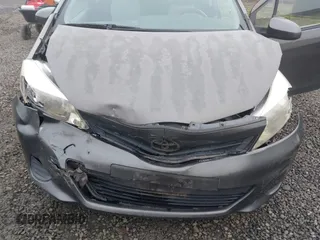 2013 Toyota Yaris L with VIN JTDJTUD39DD560766, listed as a IAAI auction lot 41031127 with 57,831 mi miles. Bid and sale history available at carsss.com. Image 6.
