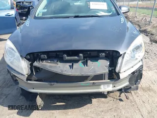 2012 Buick Verano with VIN 1G4PP5SK7C4209007, listed as a IAAI auction lot 42001351 with 34,328 mi miles and . Bid and sale history available at carsss.com. Image 6.