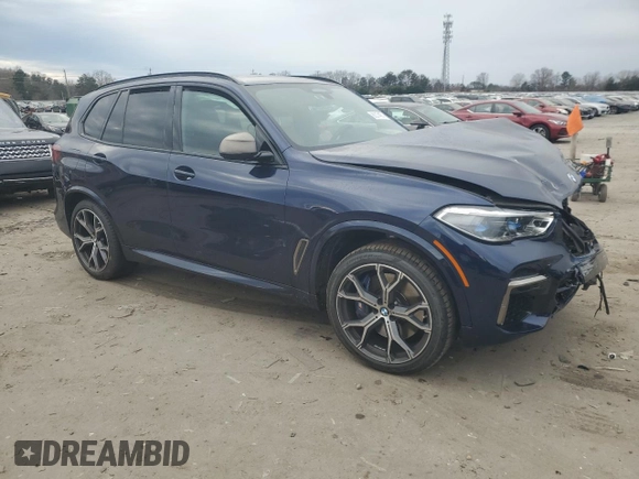 2022 BMW X5 M50i with VIN 5UXJU4C04N9J66230, listed as a Copart auction lot 86374124 with 0 mi miles and Salvage Title. Bid and sale history available at carsss.com. Image 4.