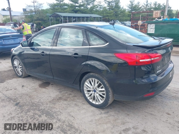 2015 Ford Focus Titanium с VIN 1FADP3J28FL213712, выставлен на аукционе IAAI как лот 42158433 с пробегом 173 696 миль миль и . История ставок и продаж доступна на DreamBid. Изображение 3.