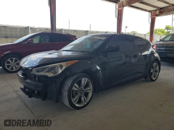 2013 Hyundai Veloster w/Gray Int z VIN KMHTC6AD8DU163465, wystawiony jako Copart lot #60276915 z przebiegiem 124 451 mil mil oraz Szkoda całkowita • Salvage title. Historia ofert i sprzedaży dostępna na DreamBid. Obrazek 1.