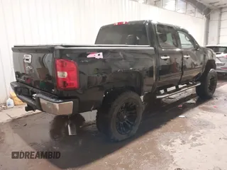 2013 Chevrolet Silverado 1500 LT with VIN 3GCPKSE75DG238194, listed as a IAAI auction lot 40997920 with 163,303 mi miles. Bid and sale history available at carsss.com. Image 4.