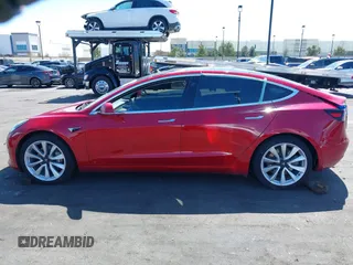 2018 Tesla Model 3 Long Range Battery with VIN 5YJ3E1EB5JF146184, listed as a IAAI auction lot 41808346 with 97,496 mi miles and . Bid and sale history available at DreamBid. Image 15.