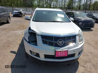 2012 Cadillac SRX Performance Collection z VIN 3GYFNBE39CS628740, wystawiony jako IAAI lot #42063414 z przebiegiem 88 260 mil mil oraz . Historia ofert i sprzedaży dostępna na DreamBid. Obrazek 12.