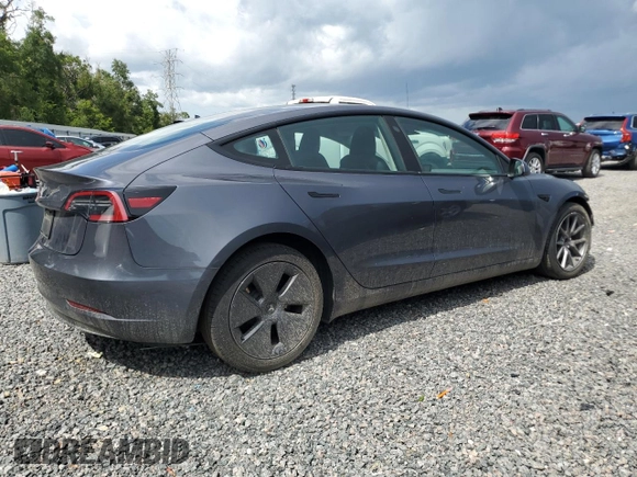 2023 Tesla Model 3 z VIN 5YJ3E1EA1PF692481, wystawiony jako Copart lot #61764165 z przebiegiem 22 649 mil mil oraz Szkoda całkowita • Salvage title. Historia ofert i sprzedaży dostępna na DreamBid. Obrazek 3.