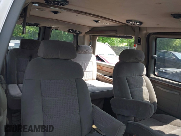 2004 Chevrolet Express Passenger with VIN 1GBFG15T041157045, listed as a IAAI auction lot 42486752 with 319,752 mi miles and . Bid and sale history available at DreamBid. Image 8.