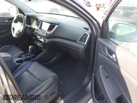 2017 Hyundai Tucson SE Plus with VIN KM8J33A40HU459575, listed as a IAAI auction lot 41703139 with 189,955 mi miles. Bid and sale history available at carsss.com. Image 5.