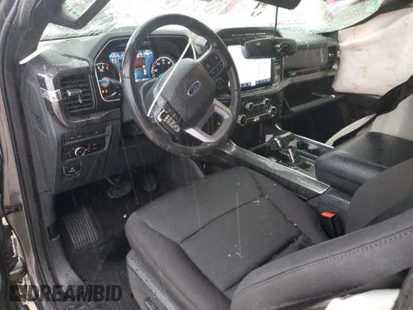 2023 Ford F-150 XL with VIN 1FTFW1E86PFA65505, listed as a Copart auction lot 60644385 with 6,959 mi miles and Salvage title. Bid and sale history available at DreamBid. Image 8.